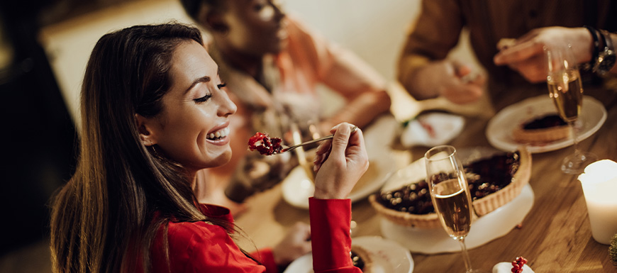 Woman eating a dessert